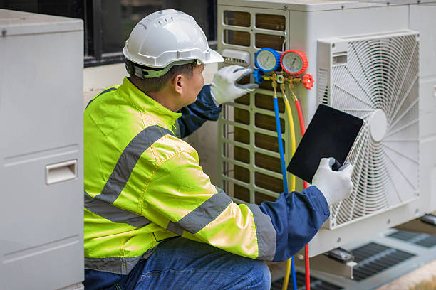 Professional Air Conditioning Repair technician working in Millfield, OH